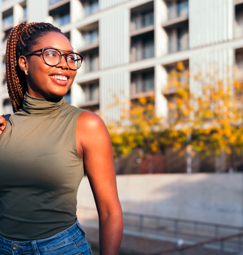 portrait-smiling-young-african-student-with-glasses-concept-youth-urban-lifestyle-copy-space-text