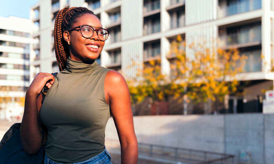 portrait-smiling-young-african-student-with-glasses-concept-youth-urban-lifestyle-copy-space-text
